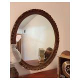 Oval mirror with ornate trim, 23w x 27”h