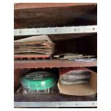 Vertical row of items, license plates, trim line, lights, blow torch, miscellaneous