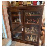 vintage dark wood double-door curio display cabinet filled43” h x 36” w x 11” d  4 shelves. No contents