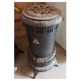 Vintage cylindrical kerosene or oil space heater