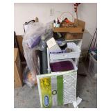 Wall mount Whirlpool microwave (working condition unknown), cabinet 15”w x 12”d x 28”h, bins on rollers, hammocks, filters, miscellaneous