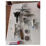 Model planes, medallions, pocket knife, harmonica