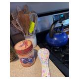 Wooden cooking utensils, spoon rest, tin, tea kettle