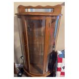 Curved glass front cabinet