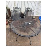 Wrought iron patio table & 4 chairs