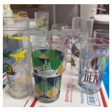 Tub of Kentucky Derby glasses and a couple of crystal brandy glasses and a juicer