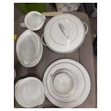 Nor take China: 13 dinner plates, 11 dessert plates, 2 serving platters, gravy bowl, sugar & creamer, 10 cereal bowls,  1 bowl with lid,  8 sherbet bowls, 10 cups
