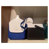 Vintage lap trays , rugs, small igloo and Coleman coolers , thermos , drain hair traps fly swatters , plastic watering can