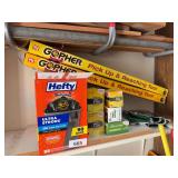 Large lot of trash bags, 2 reaching tools