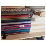 2 stacks of material(white & colored)