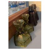 Pair of green glass coin spot candleholders, pair of viking brown glass candle holders