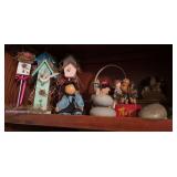 Two shelves of miscellaneous decor items