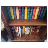 Shelf of Readers Digest Books and shelf of miscellaneous books