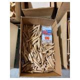Lot of clothes pins, wooden board