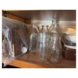 Glass milk bottles, Schlitz Beer pail, plastic storage containers