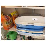 Cat litter boxes, baking soda, cat litter