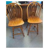 Pair of wooden swivel barstools