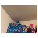 Shelf of ziplock bags of various sizes , trash bags , wax paper , foil , Saran Wrap and swifter