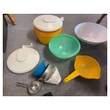 2 salad spinners, 2 Tupperware strainers, 2 plastic bowls, funnels