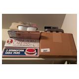Spring form pans , cake decorating supplies , small muffin pans