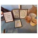 Four framed needlepoint pieces, three waste baskets