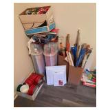 Christmas wrapping paper, tins , bows, gift boxes