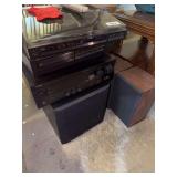 Yamaha stereo, receiver turntable and disc player, 5 Polk Audio speakers, Paradigm speaker,