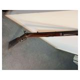 Antique black powder wall hanger rifle