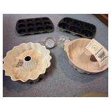 Pampered Chef stoneware fluted pan, metal fluted pan, 2 iron bundt pans
