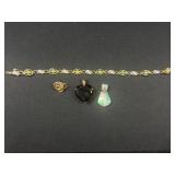 Sterling Silver bracelet, earring, and charms