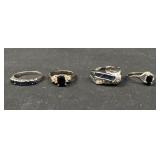 4 Fashion Rings with blue and black gems