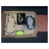 Rock necklace, charm bracelet, and more