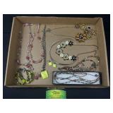 Beaded necklaces, earrings, and bracelets