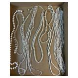 9 pearl like necklaces