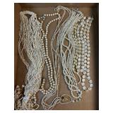 7 pearl like necklaces