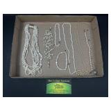 Pearl like bracelets and necklaces