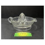 Clear glass orange juicer