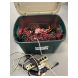 Tote of Christmas lights, tiners & power strips