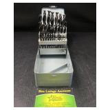 Drill bit set with metal storage
