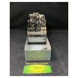 Drill bit set with metal storage