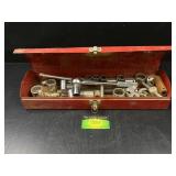 Wrench and sockets in metal toolbox