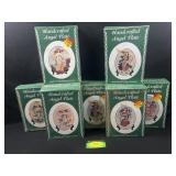 7 Handcrafted Angel plates NIB