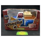 M&Mï¿½s Sweet Wheelinï¿½ candy dispenser