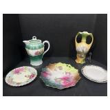 Glass plates, tea pot, and vase