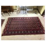 Two Handwoven Oriental Rugs in Red Tones