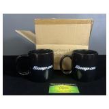 Four Snap On color changing mugs