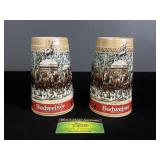 Two Budweiser king of beers steins