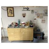 Sewing items and dresser