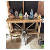 Bird houses and wooden shelf