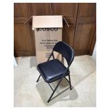 4 Cosco Vinyl Folding Chairs
